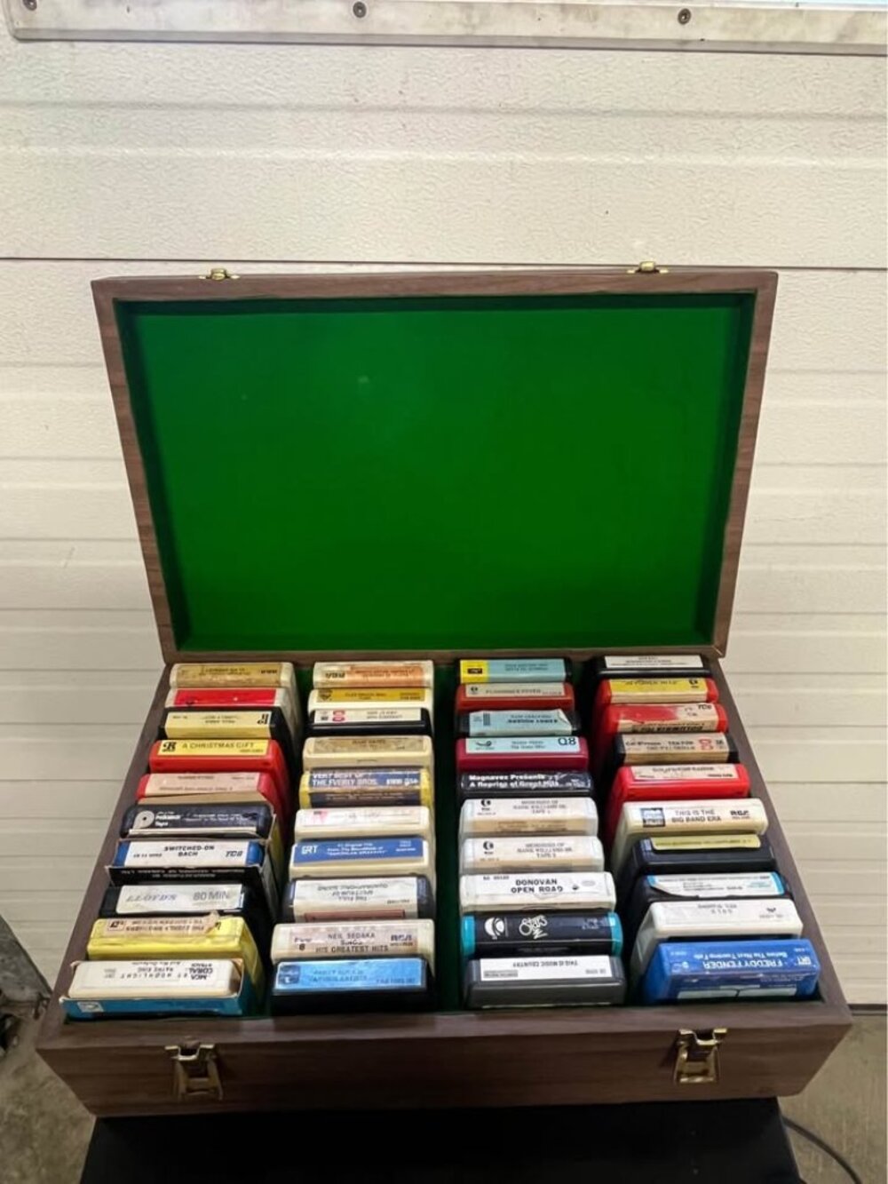 Vintage 8-Track Tape Collection with Wooden Storage Case